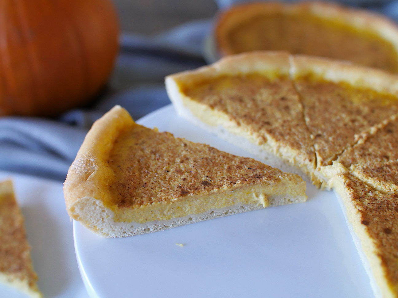 Pumpkin Küchen | Milk & Cereal | You know pumpkin is not just for Thanksgiving, so make this German custard dessert for Christmas! The crust is soft and puffy, and the custard is perfectly spiced. You and your family will LOVE it!